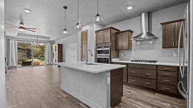 Luxury townhome just steps away from the award winning Redlands on The Golf Club At Redlands Mesa in Colorado - for sale on GolfHomes.com, golf home, golf lot