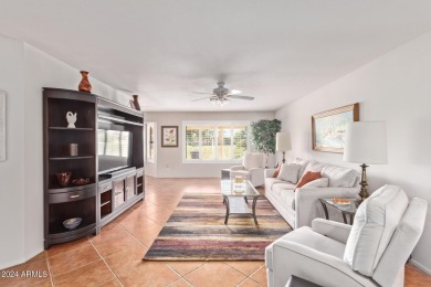 Step into this spacious, sun-soaked 3-bedroom, 2-bath San Simeon on Stardust Golf Course in Arizona - for sale on GolfHomes.com, golf home, golf lot