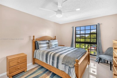 Spacious 3-bedroom, 2-bath corner unit located on the top floor on Woodlands Country Club in Florida - for sale on GolfHomes.com, golf home, golf lot