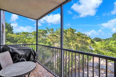 Spacious 3-bedroom, 2-bath corner unit located on the top floor on Woodlands Country Club in Florida - for sale on GolfHomes.com, golf home, golf lot