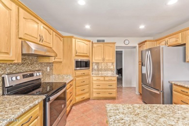 Step into this spacious, sun-soaked 3-bedroom, 2-bath San Simeon on Stardust Golf Course in Arizona - for sale on GolfHomes.com, golf home, golf lot