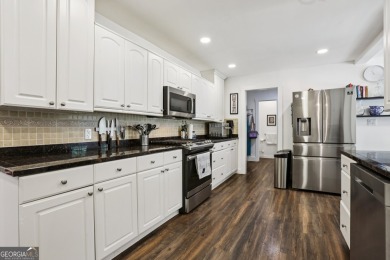 Charming Ranch Retreat in Peachtree City's most coveted location on Canongate At Flat Creek Club in Georgia - for sale on GolfHomes.com, golf home, golf lot