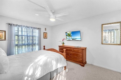 Spacious 3-bedroom, 2-bath corner unit located on the top floor on Woodlands Country Club in Florida - for sale on GolfHomes.com, golf home, golf lot