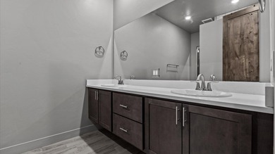 Luxury townhome just steps away from the award winning Redlands on The Golf Club At Redlands Mesa in Colorado - for sale on GolfHomes.com, golf home, golf lot