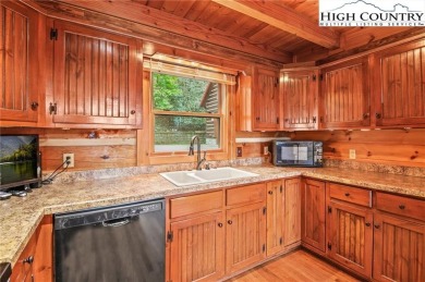 Views abound in this well-maintained log home in the desirable on Blowing Rock Country Club in North Carolina - for sale on GolfHomes.com, golf home, golf lot