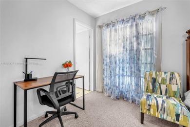 Spacious 3-bedroom, 2-bath corner unit located on the top floor on Woodlands Country Club in Florida - for sale on GolfHomes.com, golf home, golf lot