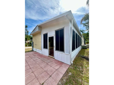 Welcome to this beautiful home move-in ready, in pet section on Spanish Lakes Golf Village in Florida - for sale on GolfHomes.com, golf home, golf lot