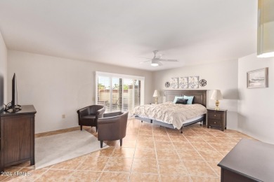 Step into this spacious, sun-soaked 3-bedroom, 2-bath San Simeon on Stardust Golf Course in Arizona - for sale on GolfHomes.com, golf home, golf lot