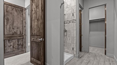 Luxury townhome just steps away from the award winning Redlands on The Golf Club At Redlands Mesa in Colorado - for sale on GolfHomes.com, golf home, golf lot