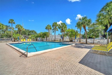 Spacious 3-bedroom, 2-bath corner unit located on the top floor on Woodlands Country Club in Florida - for sale on GolfHomes.com, golf home, golf lot