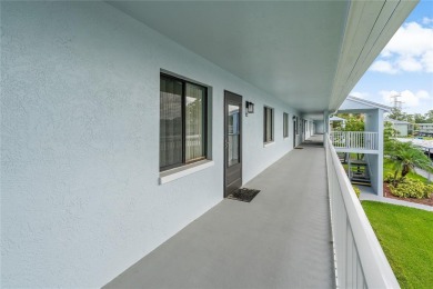 Maintenance-Free Living in East Lake Woodlands - Pinellas on East Lake Woodlands Country Club in Florida - for sale on GolfHomes.com, golf home, golf lot