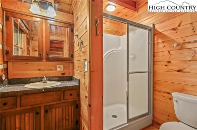 Views abound in this well-maintained log home in the desirable on Blowing Rock Country Club in North Carolina - for sale on GolfHomes.com, golf home, golf lot