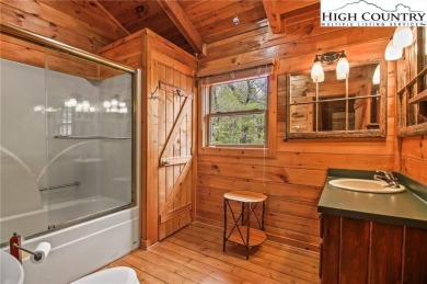 Views abound in this well-maintained log home in the desirable on Blowing Rock Country Club in North Carolina - for sale on GolfHomes.com, golf home, golf lot