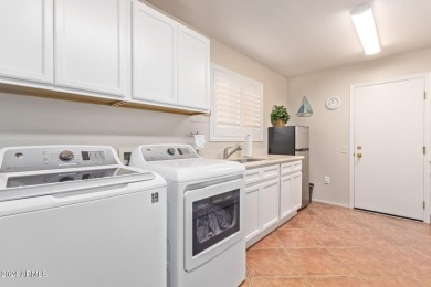 Step into this spacious, sun-soaked 3-bedroom, 2-bath San Simeon on Stardust Golf Course in Arizona - for sale on GolfHomes.com, golf home, golf lot