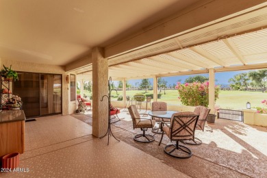 Step into this spacious, sun-soaked 3-bedroom, 2-bath San Simeon on Stardust Golf Course in Arizona - for sale on GolfHomes.com, golf home, golf lot