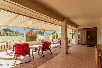 Step into this spacious, sun-soaked 3-bedroom, 2-bath San Simeon on Stardust Golf Course in Arizona - for sale on GolfHomes.com, golf home, golf lot