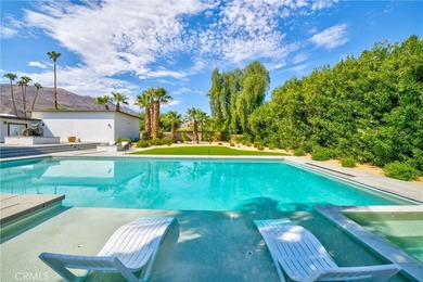 Step into this historic, single-level home in Rancho Mirage on Rancho Las Palmas Country Club in California - for sale on GolfHomes.com, golf home, golf lot