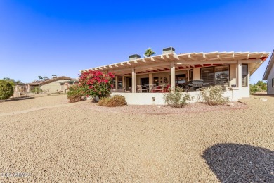 Step into this spacious, sun-soaked 3-bedroom, 2-bath San Simeon on Stardust Golf Course in Arizona - for sale on GolfHomes.com, golf home, golf lot