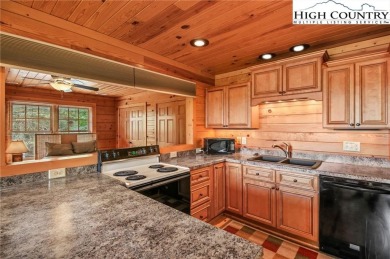 Views abound in this well-maintained log home in the desirable on Blowing Rock Country Club in North Carolina - for sale on GolfHomes.com, golf home, golf lot