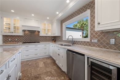 Step into this historic, single-level home in Rancho Mirage on Rancho Las Palmas Country Club in California - for sale on GolfHomes.com, golf home, golf lot