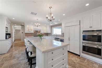 Step into this historic, single-level home in Rancho Mirage on Rancho Las Palmas Country Club in California - for sale on GolfHomes.com, golf home, golf lot