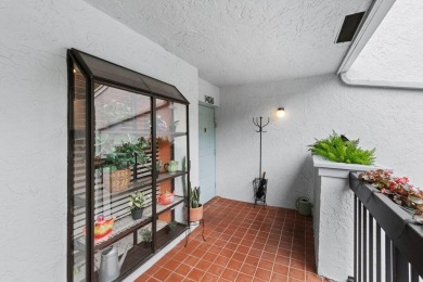 This home is nestled in the active gated community of Boca on Boca Delray Golf and Country Club in Florida - for sale on GolfHomes.com, golf home, golf lot