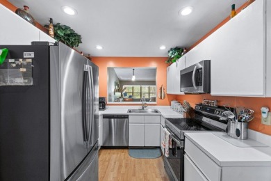 This home is nestled in the active gated community of Boca on Boca Delray Golf and Country Club in Florida - for sale on GolfHomes.com, golf home, golf lot