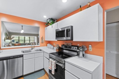 This home is nestled in the active gated community of Boca on Boca Delray Golf and Country Club in Florida - for sale on GolfHomes.com, golf home, golf lot