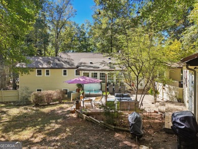 Charming Ranch Retreat in Peachtree City's most coveted location on Canongate At Flat Creek Club in Georgia - for sale on GolfHomes.com, golf home, golf lot