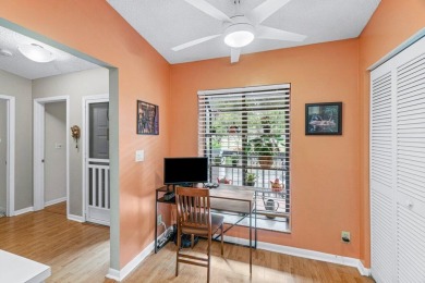 This home is nestled in the active gated community of Boca on Boca Delray Golf and Country Club in Florida - for sale on GolfHomes.com, golf home, golf lot