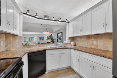 STUNNING FULLY RENOVATED 2 BEDROOM 2 BATH CONDO BOASTING 1800 SQ on  in Florida - for sale on GolfHomes.com, golf home, golf lot