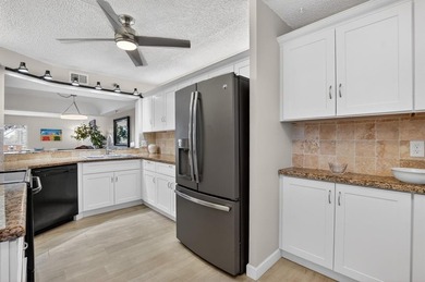 STUNNING FULLY RENOVATED 2 BEDROOM 2 BATH CONDO BOASTING 1800 SQ on  in Florida - for sale on GolfHomes.com, golf home, golf lot