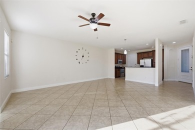 Experience luxury living in this stunning 3-bedroom, 2.5-bath on Eagle Creek Golf Club in Florida - for sale on GolfHomes.com, golf home, golf lot