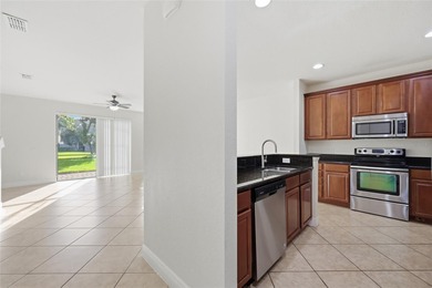 Experience luxury living in this stunning 3-bedroom, 2.5-bath on Eagle Creek Golf Club in Florida - for sale on GolfHomes.com, golf home, golf lot