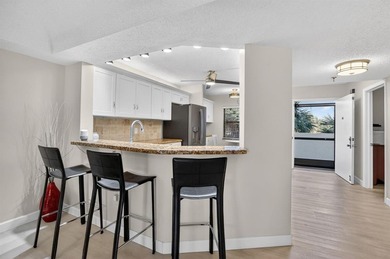 STUNNING FULLY RENOVATED 2 BEDROOM 2 BATH CONDO BOASTING 1800 SQ on  in Florida - for sale on GolfHomes.com, golf home, golf lot