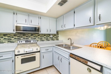 Wake up to sweeping views of the Rockledge Country Club golf on Rockledge Country Club in Florida - for sale on GolfHomes.com, golf home, golf lot