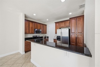 Experience luxury living in this stunning 3-bedroom, 2.5-bath on Eagle Creek Golf Club in Florida - for sale on GolfHomes.com, golf home, golf lot