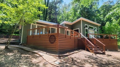 Wonderful modern style home in the piney woods of east Texas on Pine Dunes Golf Course in Texas - for sale on GolfHomes.com, golf home, golf lot