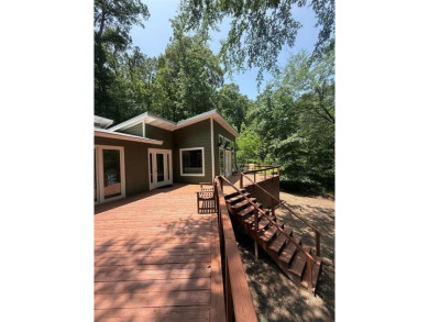 Wonderful modern style home in the piney woods of east Texas on Pine Dunes Golf Course in Texas - for sale on GolfHomes.com, golf home, golf lot