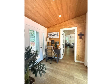 Wonderful modern style home in the piney woods of east Texas on Pine Dunes Golf Course in Texas - for sale on GolfHomes.com, golf home, golf lot