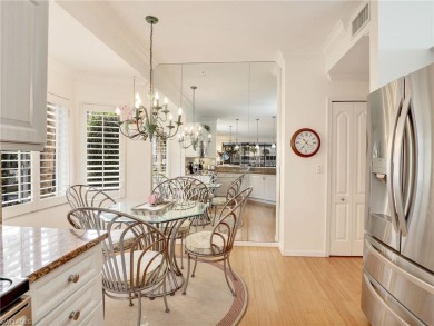 3bd 2 ba end unit condo, with a beautiful lake view. Condo has on Club at Pelican Bay Golf Course in Florida - for sale on GolfHomes.com, golf home, golf lot