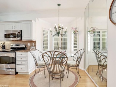 3bd 2 ba end unit condo, with a beautiful lake view. Condo has on Club at Pelican Bay Golf Course in Florida - for sale on GolfHomes.com, golf home, golf lot