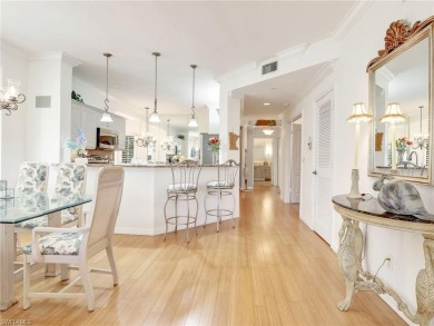 3bd 2 ba end unit condo, with a beautiful lake view. Condo has on Club at Pelican Bay Golf Course in Florida - for sale on GolfHomes.com, golf home, golf lot