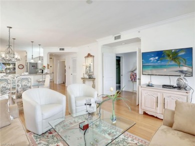 3bd 2 ba end unit condo, with a beautiful lake view. Condo has on Club at Pelican Bay Golf Course in Florida - for sale on GolfHomes.com, golf home, golf lot