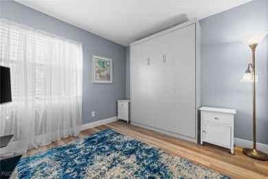 This desirable first-floor end unit in Cross Creek Country Club on Cross Creek Country Club in Florida - for sale on GolfHomes.com, golf home, golf lot