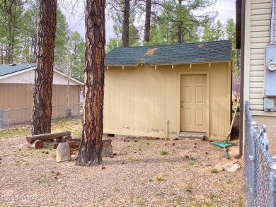 Charming Mountain Retreat nestled in the serene Fairway Park on Bison Golf and Country Club in Arizona - for sale on GolfHomes.com, golf home, golf lot