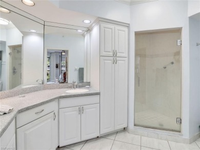3bd 2 ba end unit condo, with a beautiful lake view. Condo has on Club at Pelican Bay Golf Course in Florida - for sale on GolfHomes.com, golf home, golf lot