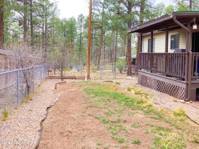 Charming Mountain Retreat nestled in the serene Fairway Park on Bison Golf and Country Club in Arizona - for sale on GolfHomes.com, golf home, golf lot