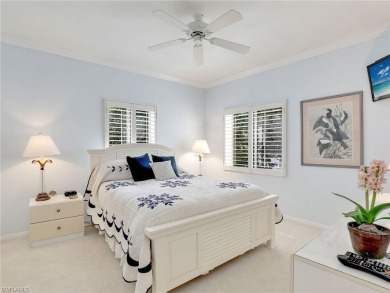 3bd 2 ba end unit condo, with a beautiful lake view. Condo has on Club at Pelican Bay Golf Course in Florida - for sale on GolfHomes.com, golf home, golf lot