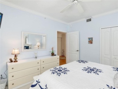 3bd 2 ba end unit condo, with a beautiful lake view. Condo has on Club at Pelican Bay Golf Course in Florida - for sale on GolfHomes.com, golf home, golf lot